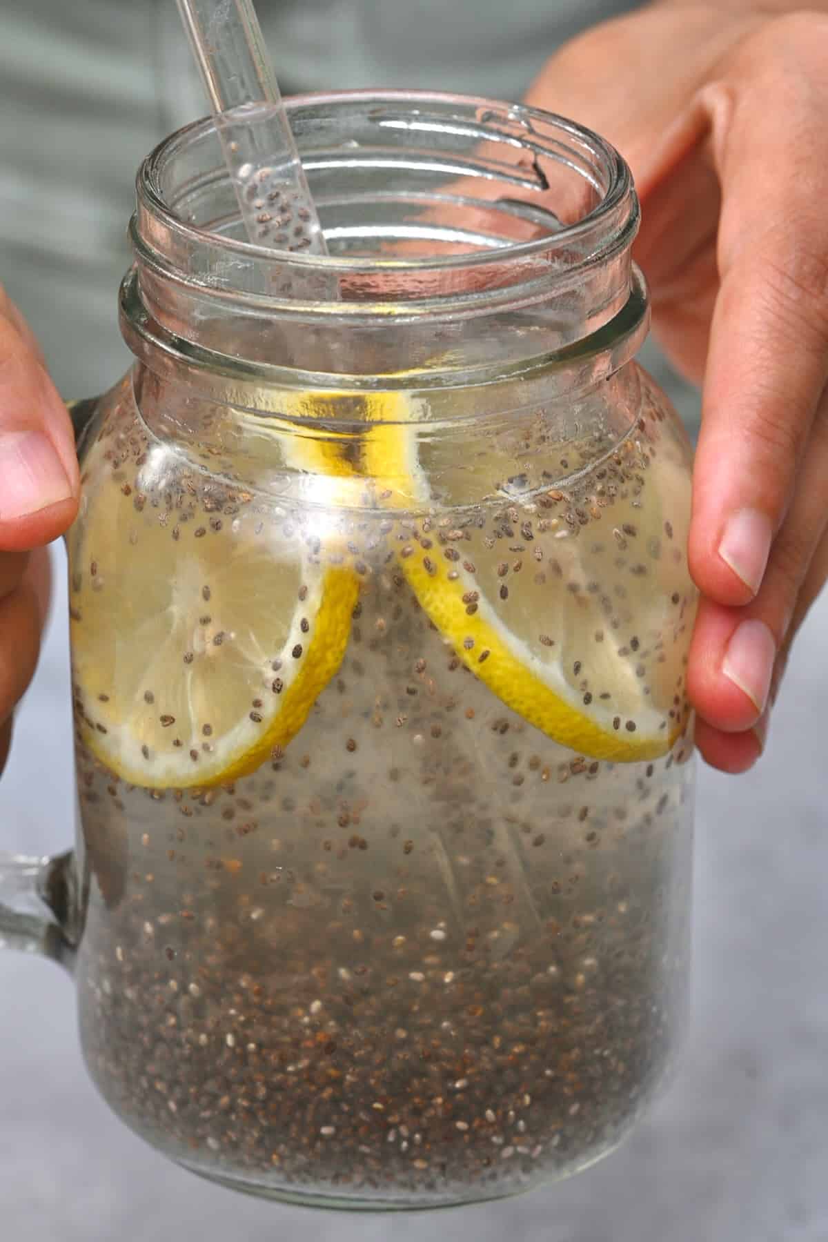 A mason jar with chia lemon water