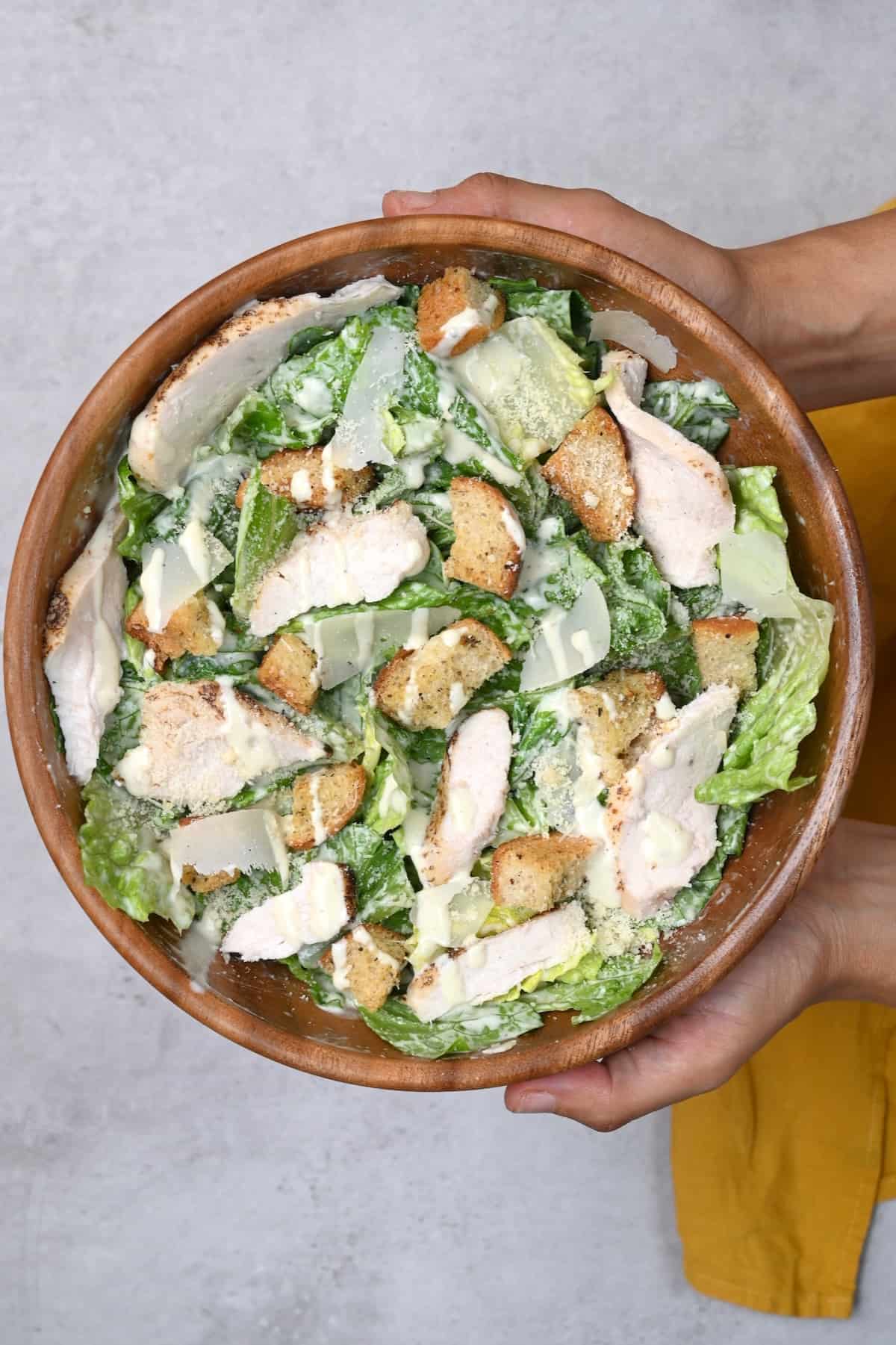 Homemade chicken Caesar salad in a serving bowl