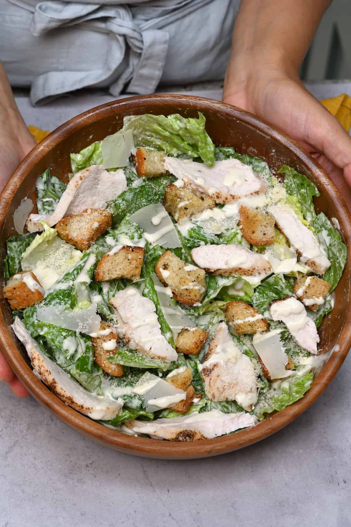 Homemade chicken Caesar salad in a serving bowl