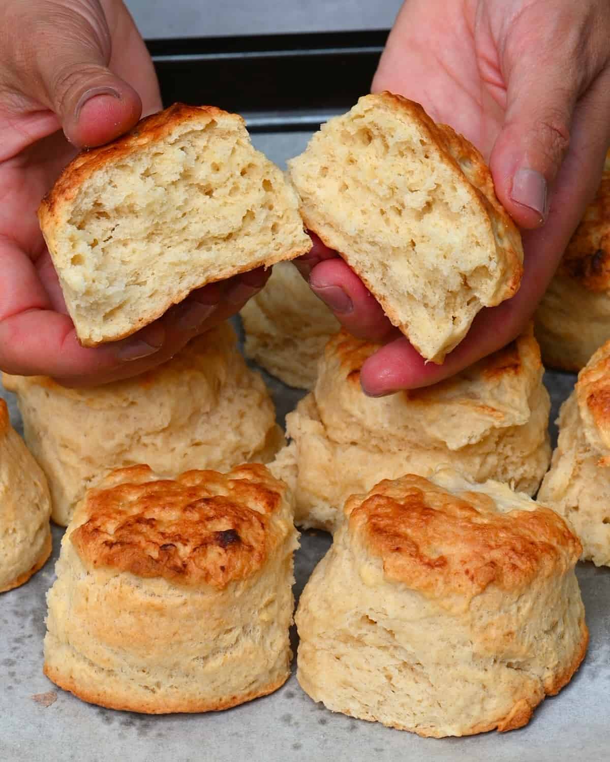 Freshly baked homemade biscuit cut into two