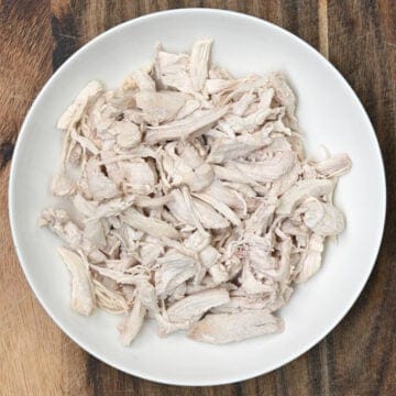 Shredded boiled chicken in a bowl