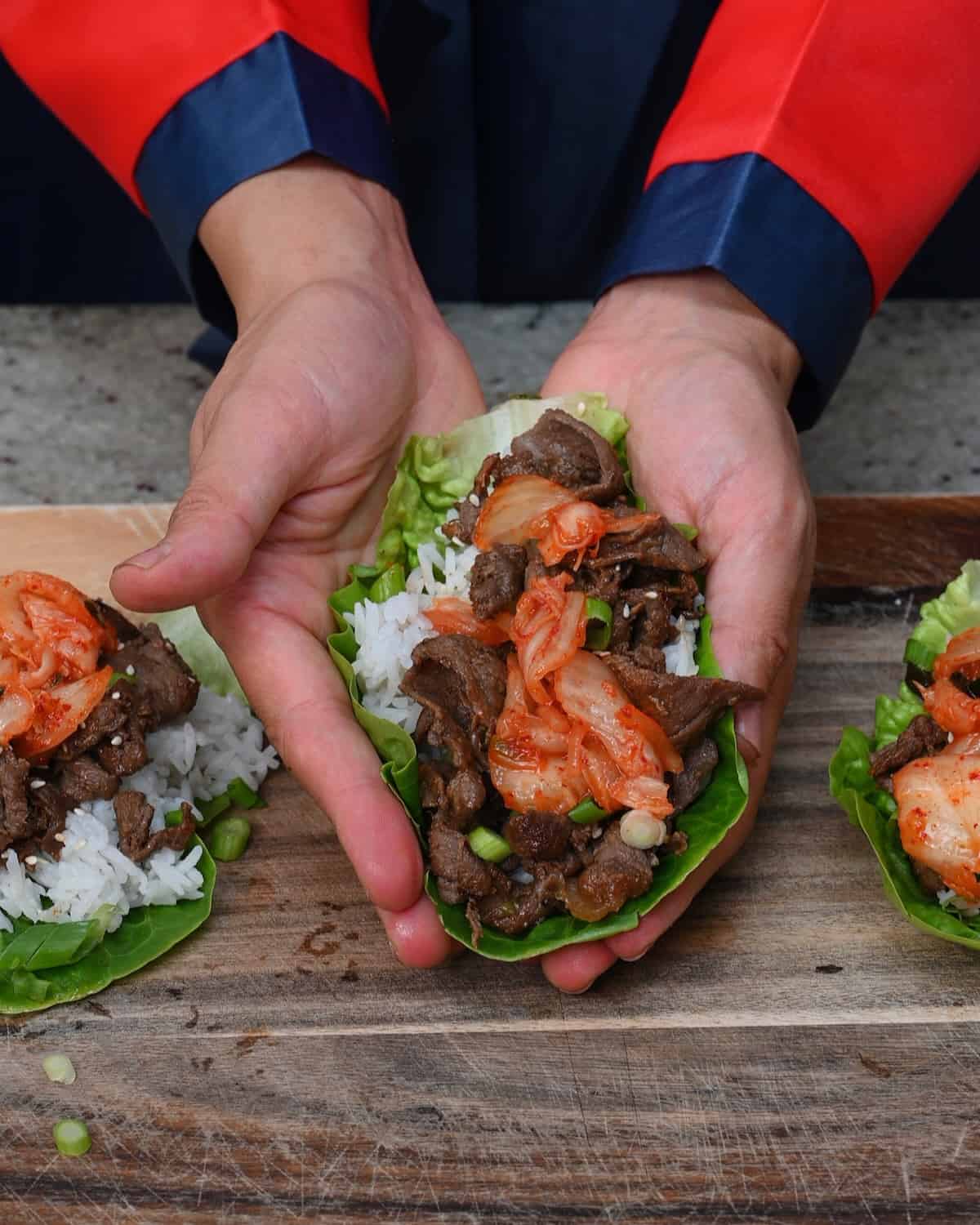 Lettuce wraps made with Korean beef, rice and kimchi