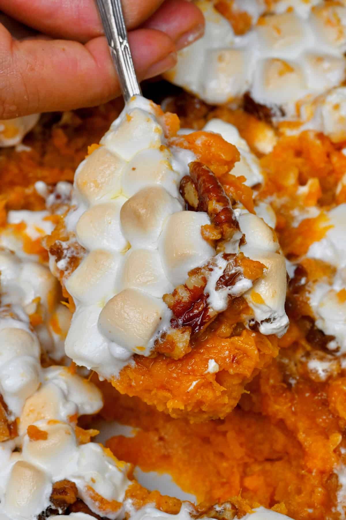 A close up of sweet potato casserole topped with marshmallow