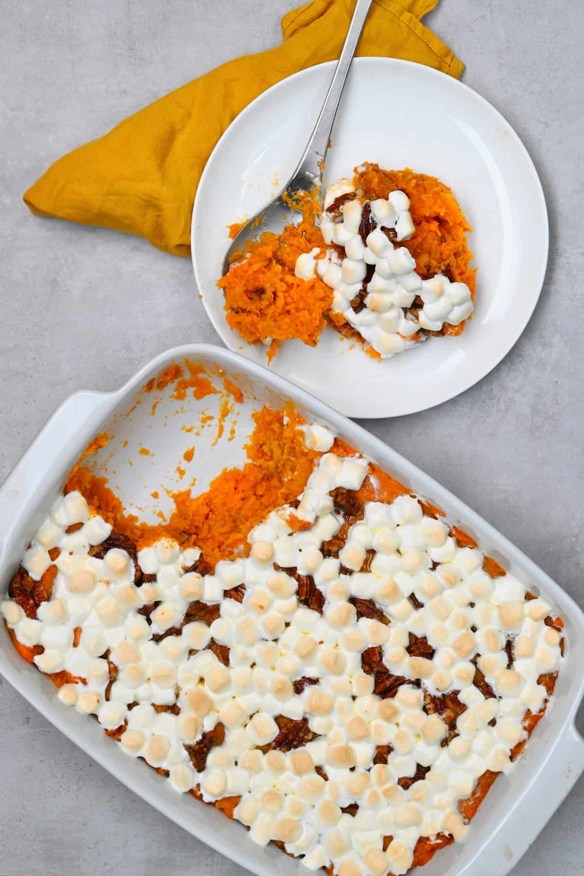 Sweet potato casserole in a baking dish and on a plate