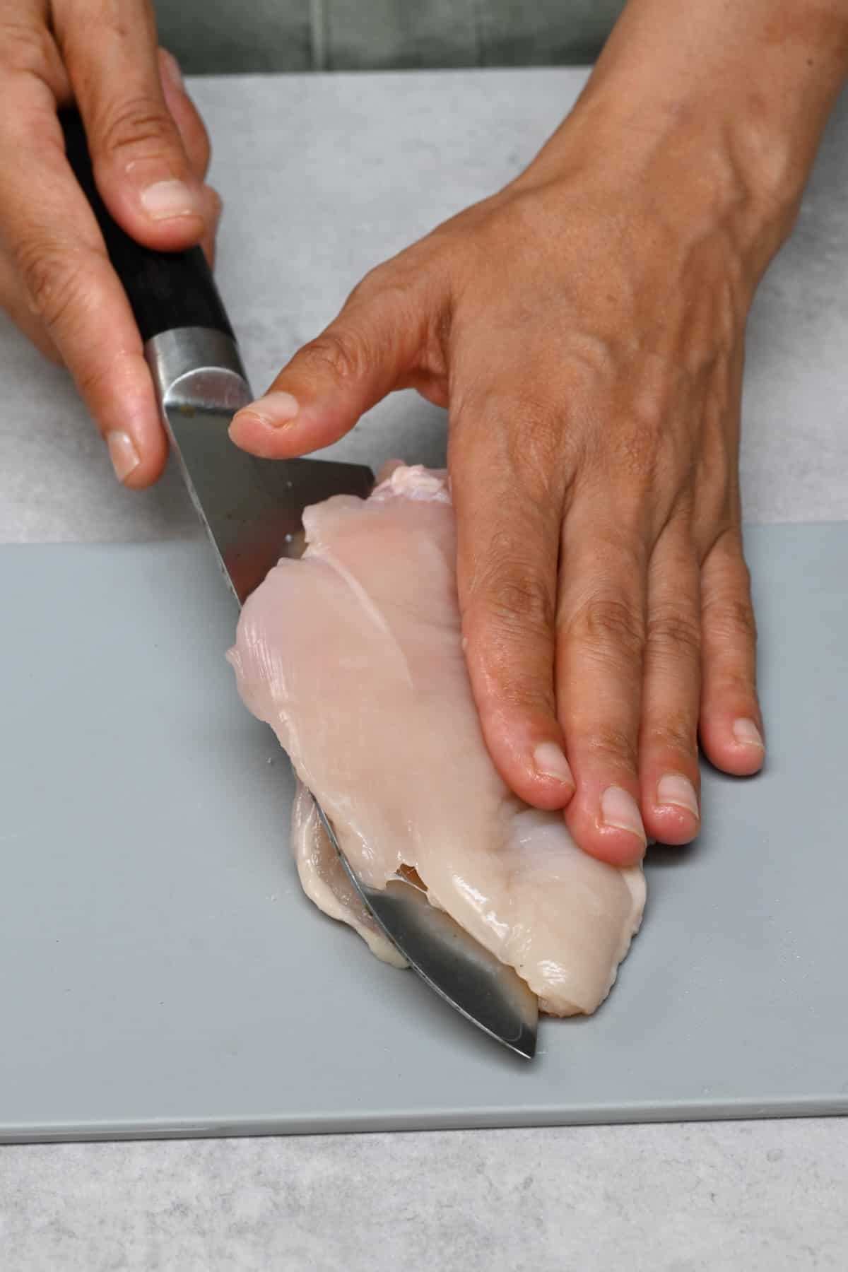 Cutting a chicken breast to thin it