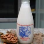 A bottle with homemade almond milk