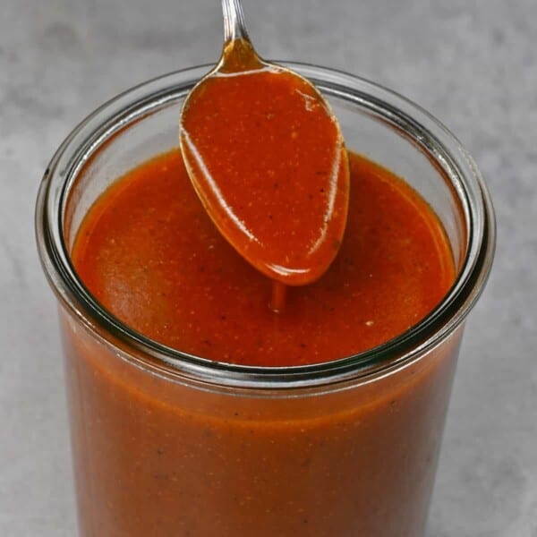 A spoonful of homemade enchilada sauce