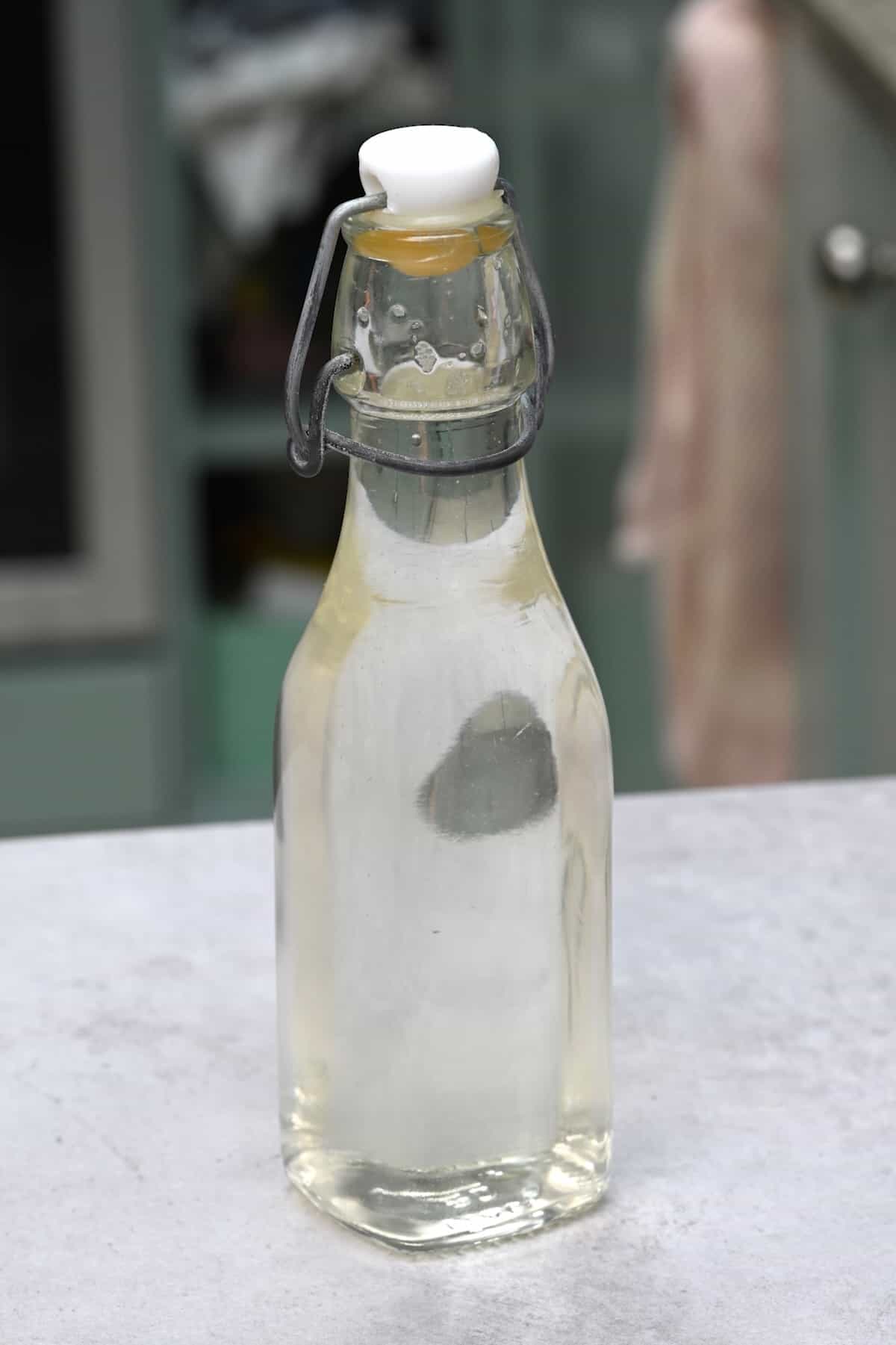 A small bottle with homemade sugar syrup