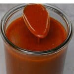 Enchilada Sauce in Container with Spoon