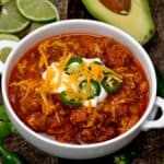 Wendy's chili in a bowl topped with cheddar cheese and jalapeño slices - 9