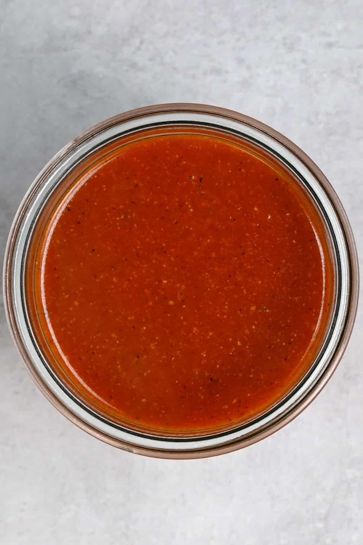 top view enchilada sauce in a jar