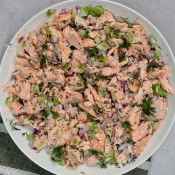 A bowl with salmon salad