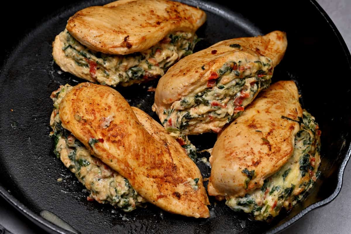 Four chicken breasts stuffed with cheese and spinach
