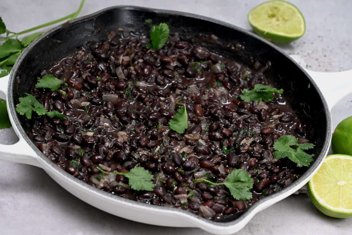 A skillet with Mexican black beans