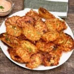 Parmesan crusted potatoes on a plate - 17