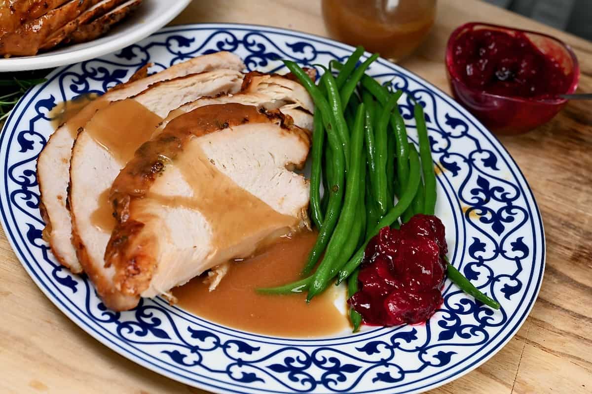 Roasted Turkey breast served with gravy and cranberry sauce