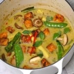 Vegan green curry in a saucepan