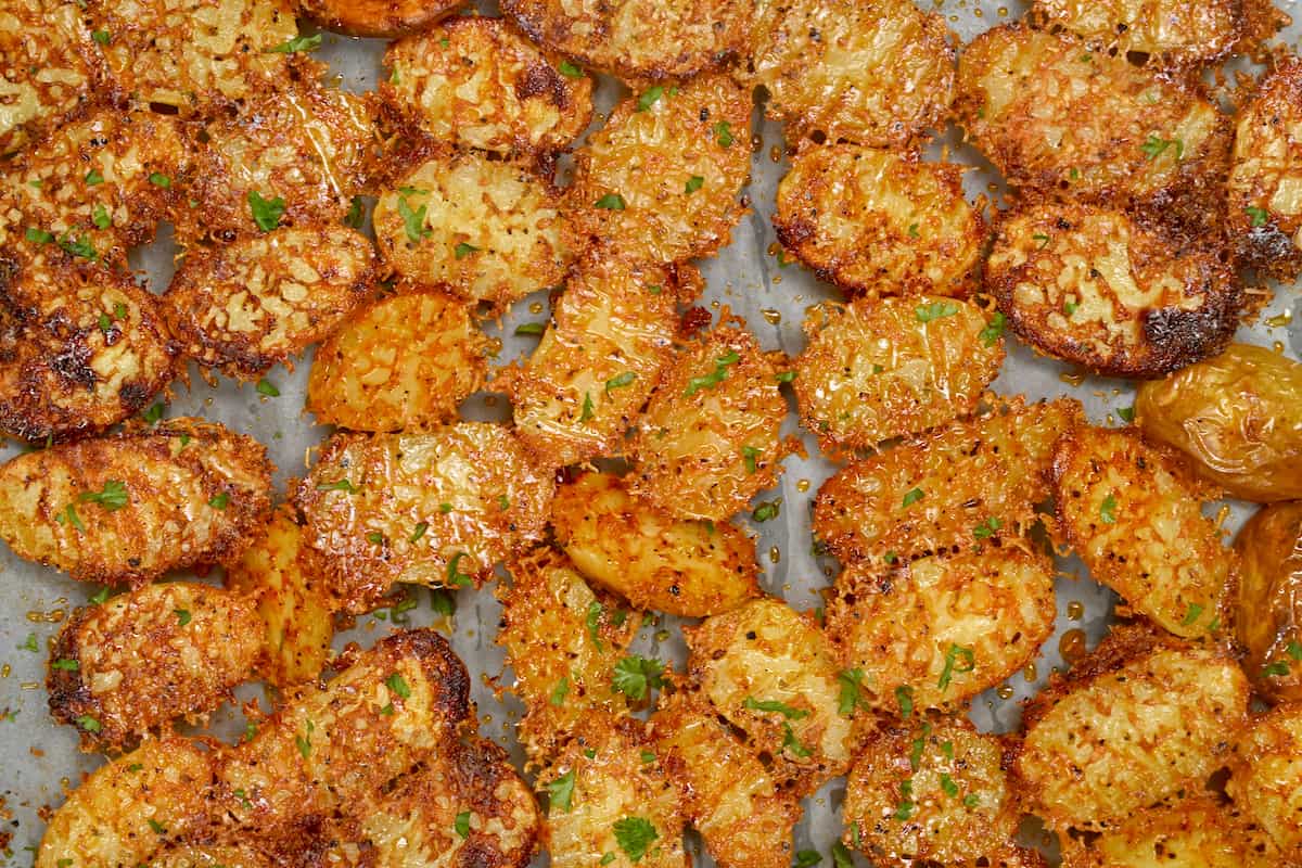 Parmesan crusted potatoes on a tray