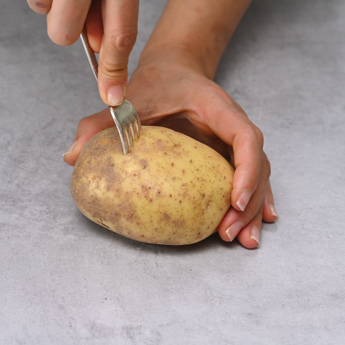use a fork to make a few pricks in the potato
