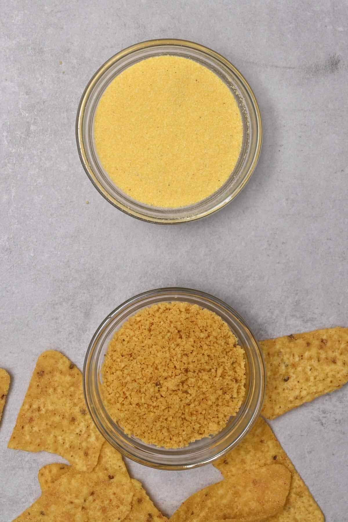 crushed tortilla chips next to cornmeal in glass bowl