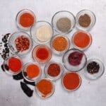 different Paprika Substitutes in little glass bowls square photo - 16