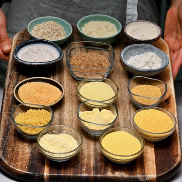 different cornmeal substitutes on a chopping board square photo