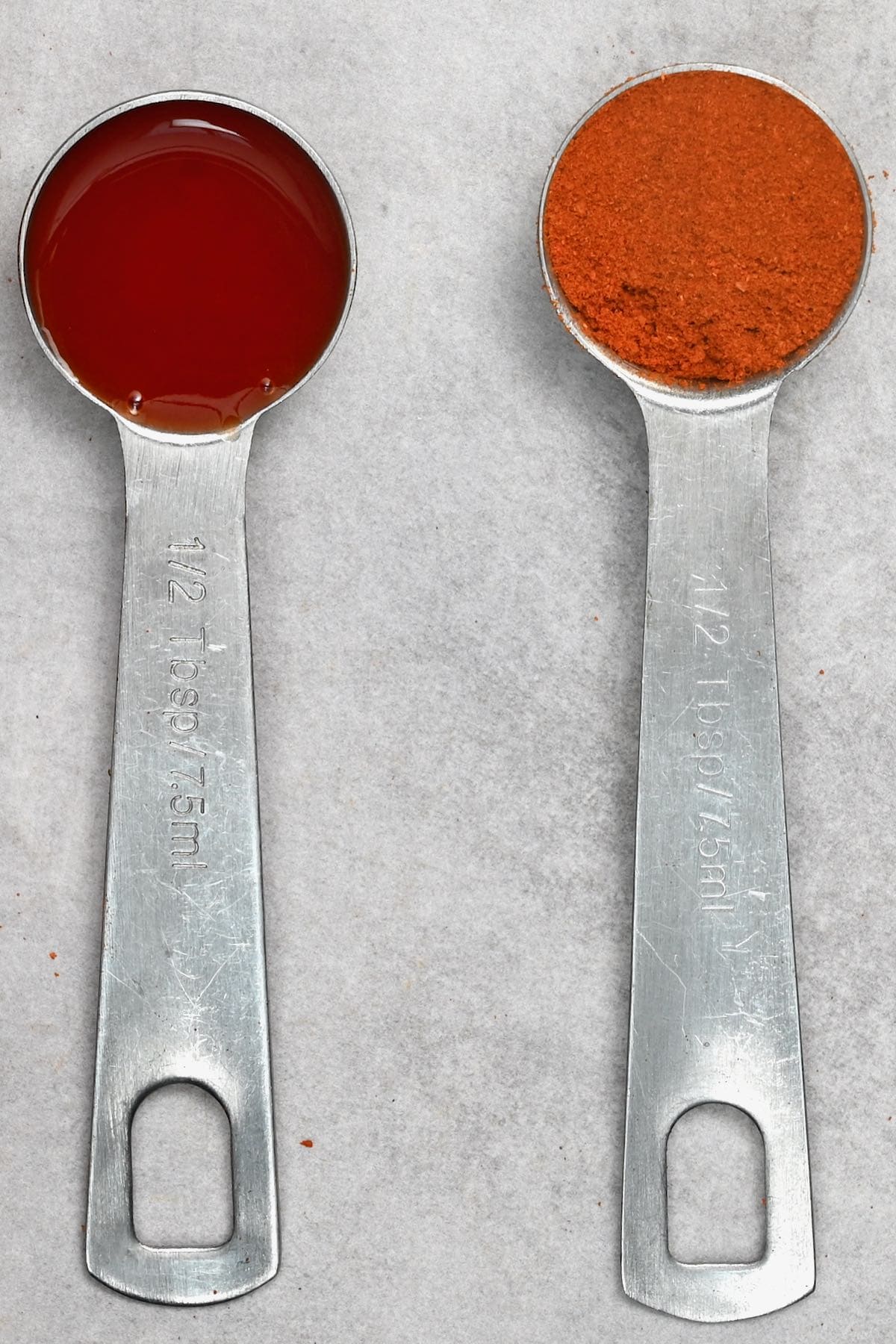 half teaspoon hot pepper sauce next to paprika