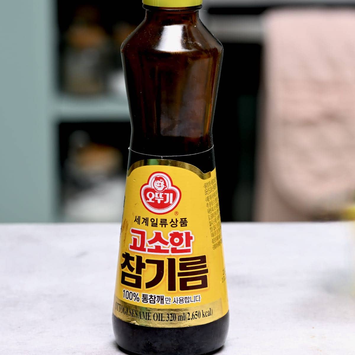 side view of a sesame seed oil bottle