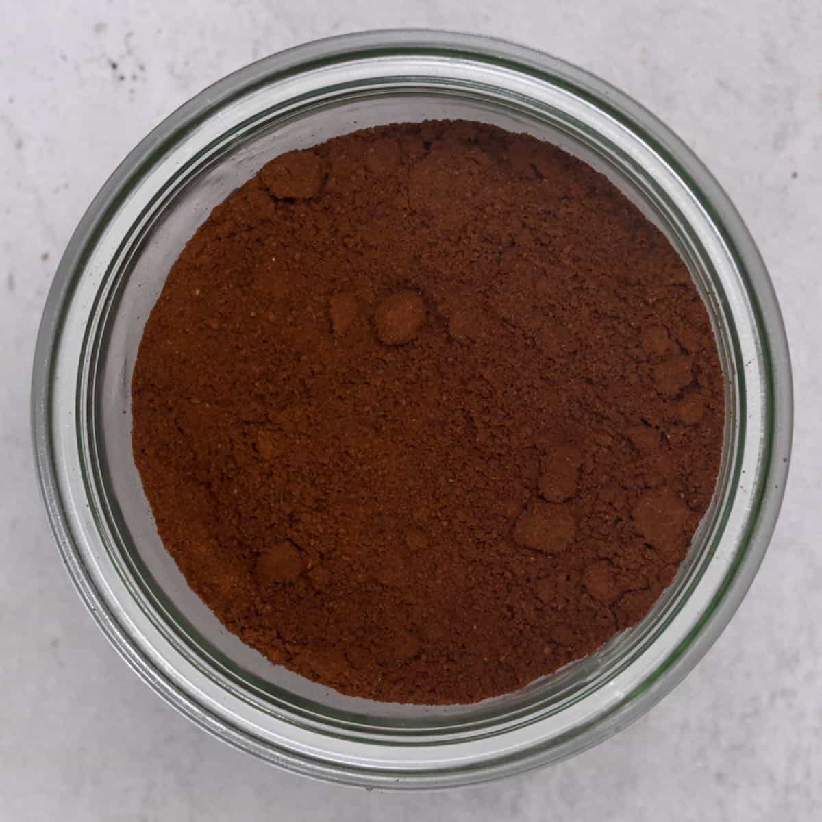 top view of esperesso powder in a glass jar