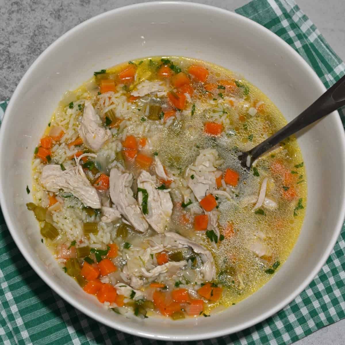 A bowl with homemade chicken and rice soup