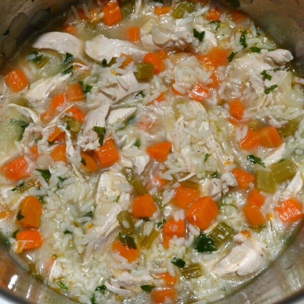 Homemade chicken and rice soup in a saucepan