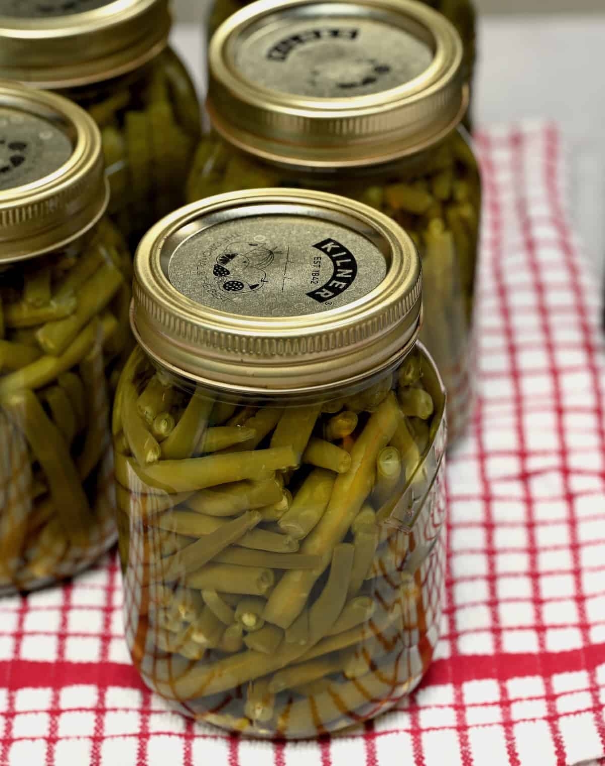 A jar with green beans canned at home