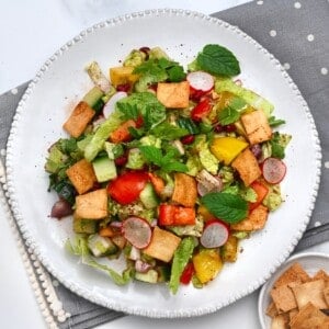 A serving of Lebanese fattoush salad topped with mint