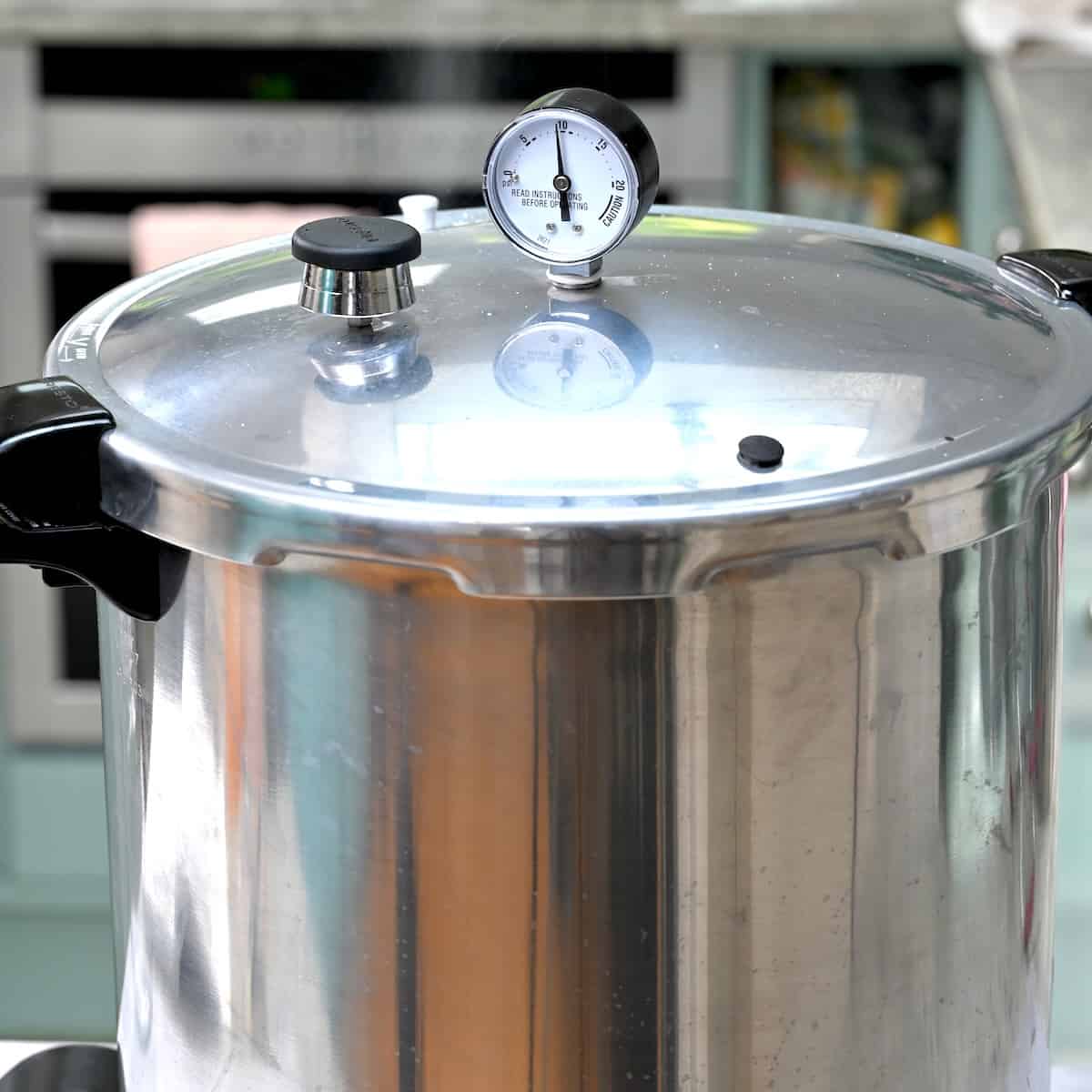 A pressure canner being heated