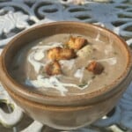 A serving of garlic soup in a small bowl - 18