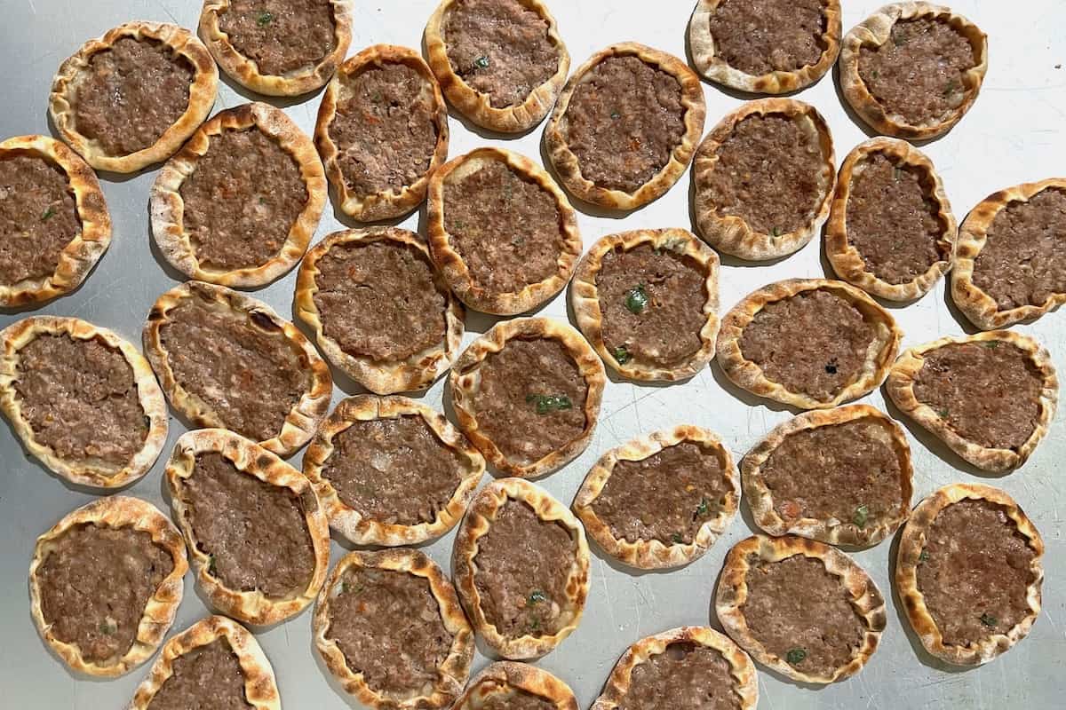 A tray of homemade Lebanese meat pies