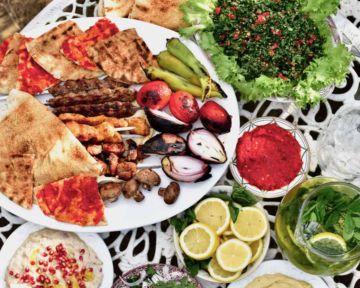 A mezze spread with meat and tabbouleh
