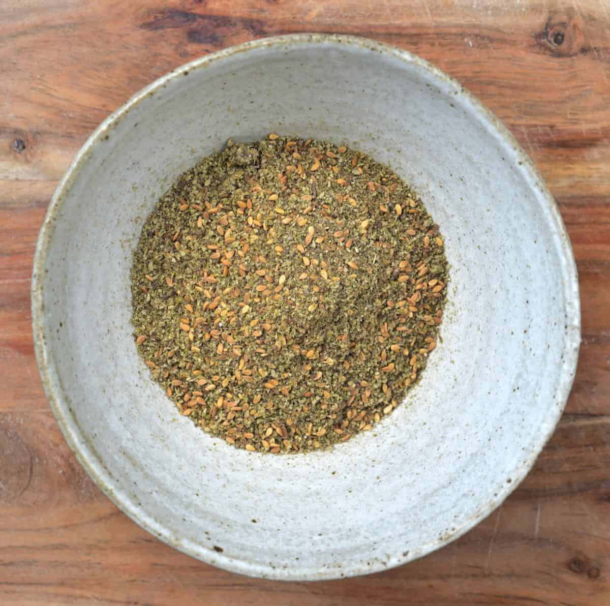 Za'atar spice in a small bowl.