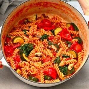 A saucepan filled with cooked pasta and vegetables - a one pot pasta dish