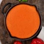 A large pan with roasted red pepper sauce - 18
