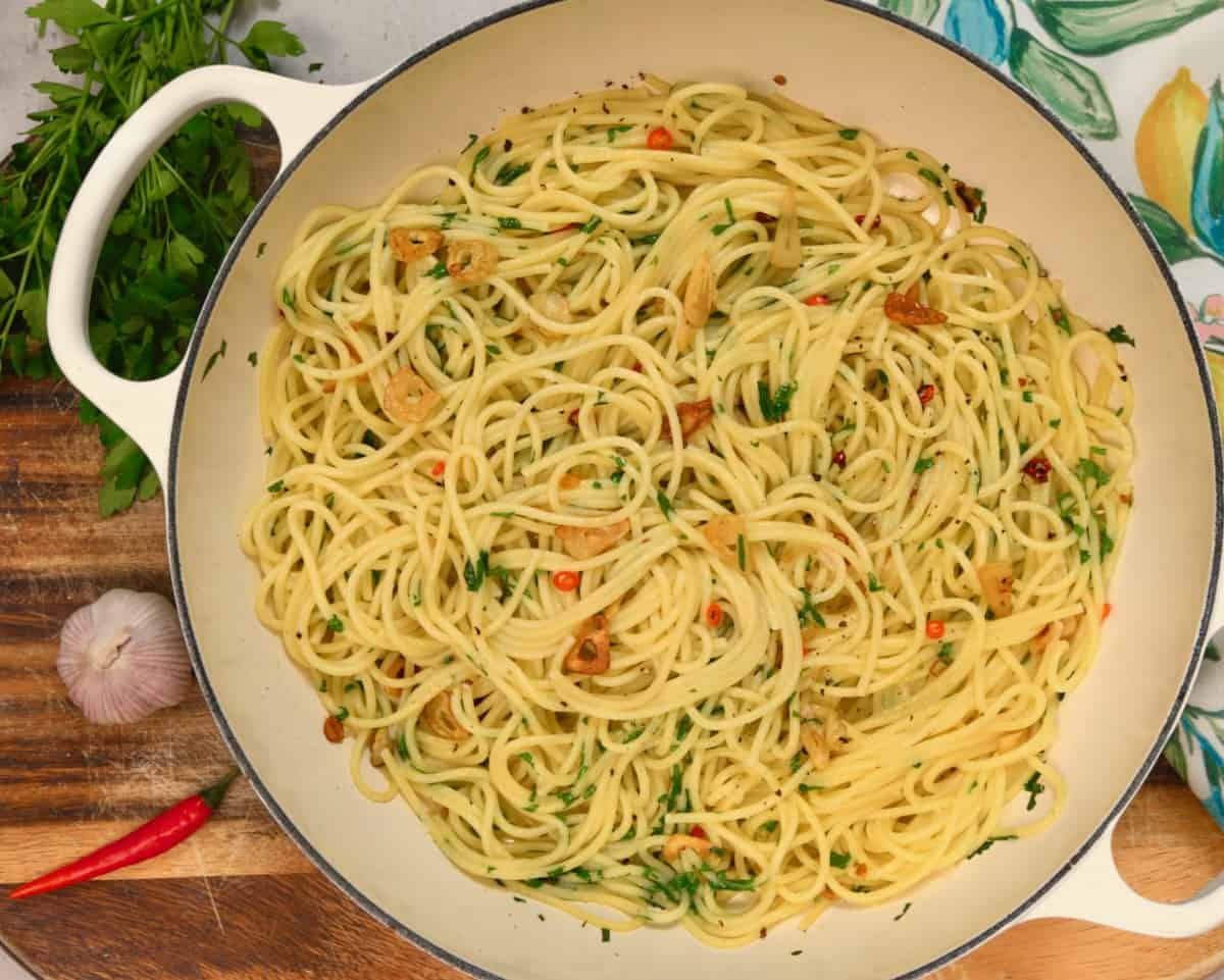A large pan with homemade garlic and olive oil spaghetti