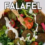 Falafel wraps topped with tahini sauce