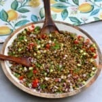 A serving dish with healthy lentil salad topped with mint leaves - 14