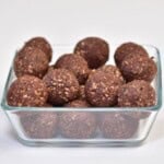 Protein almond and date balls in a glass container - 15