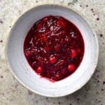 A bowl with homemade mixed berry compote.