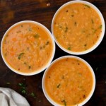 Three serving bowls with Lebanese lentil soup. - 13