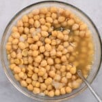 A bowl with tender cooked chickpeas. - 12