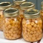 Five jars with home-canned chickpeas.