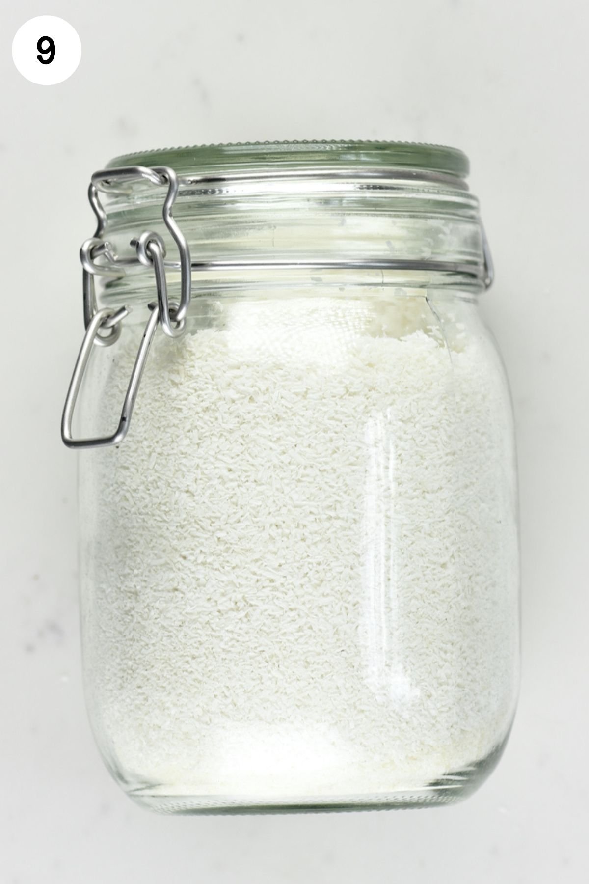 A jar of storage for homemade fresh desiccated coconut.