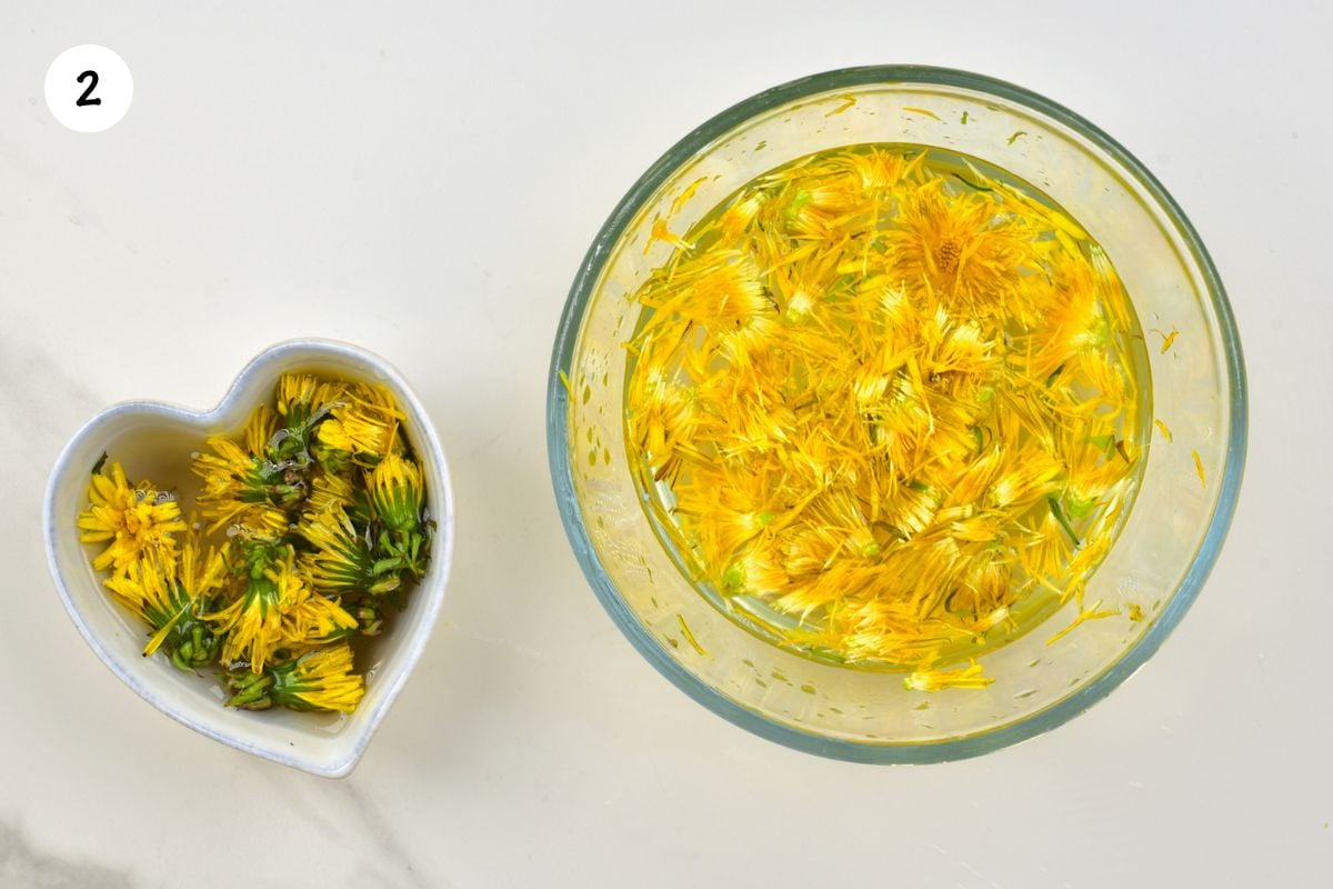 Rinsing the dandelion petals in a bowl with water.